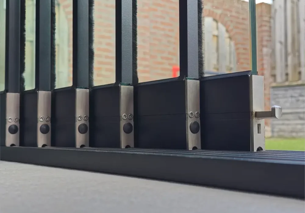 Glazen schuifwanden in Limburg van een veranda